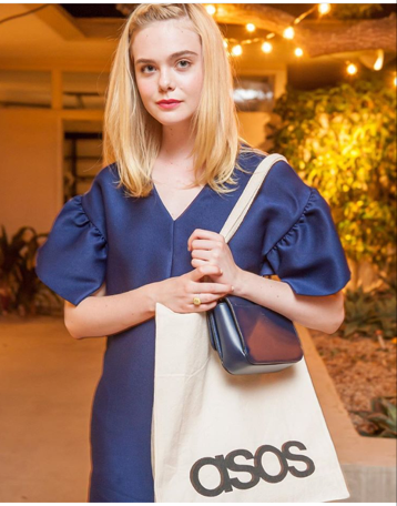 Elle Fanning ASOS white jumpsuit with frill sleeves.