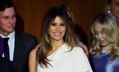 Melania Trump in a white ralph lauren jumpsuit