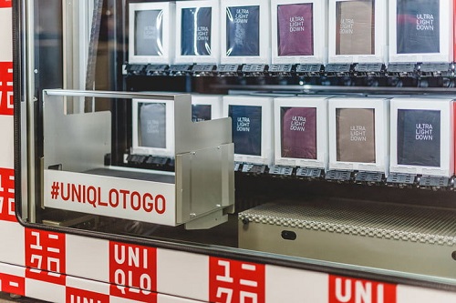 A UNIQLO to Go Vending Machine dispenses T-shirts