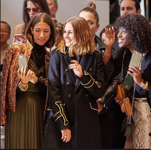 Olivia Palermo meets fans in Banana Republic coat today at Banana Republic presentation today at